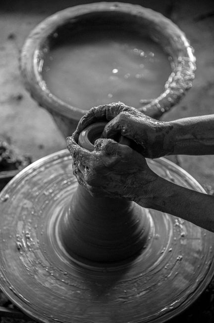 Artisan shaping clay