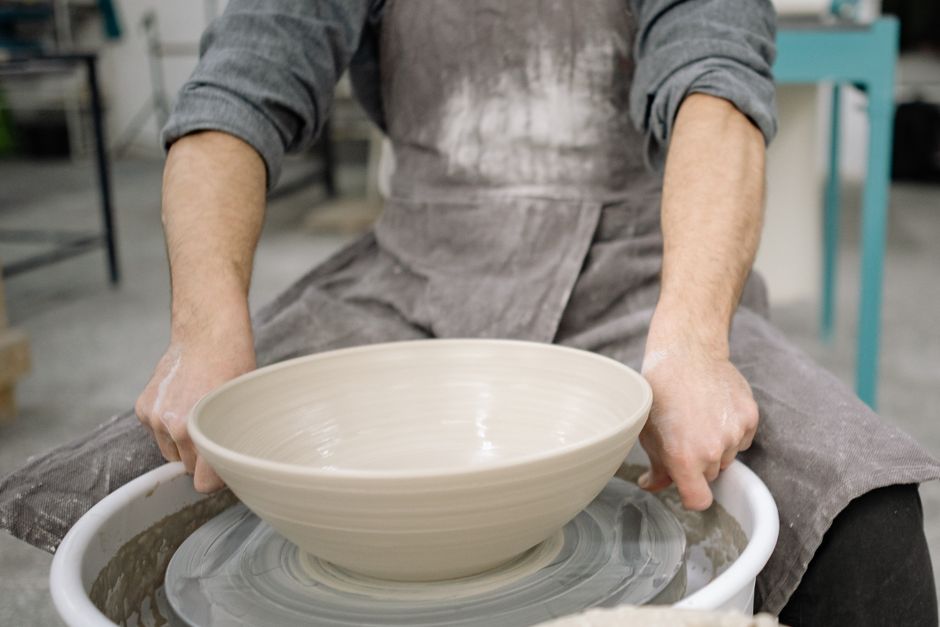 Potter's hands on wheel